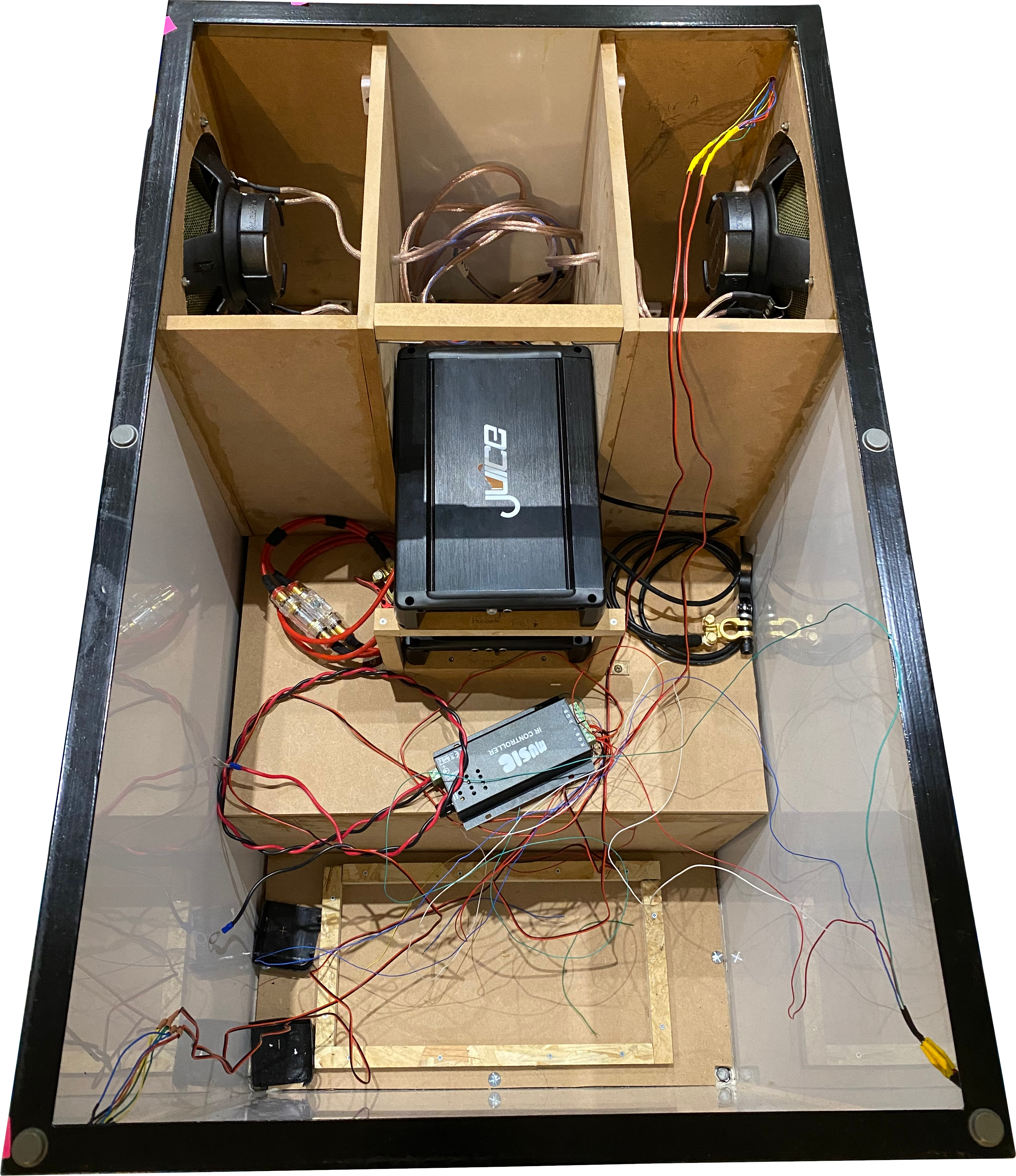 Here you can see the cabinets for the triaxial speakers. Also, the Amplifiers are mounted too. Still at wire-spaghetti stage here... Speakers Interior