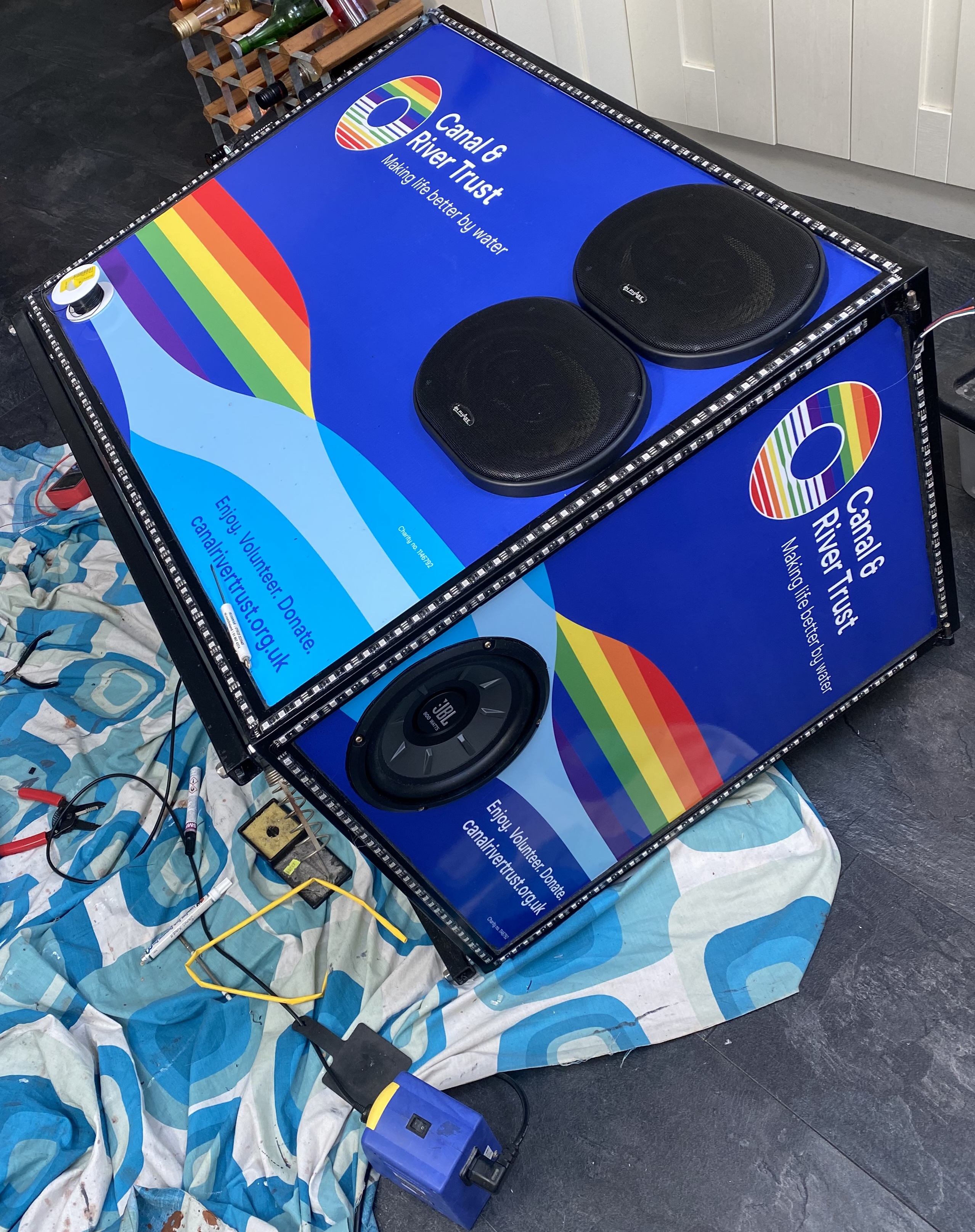 Triaxial speakers fitted, and the LEDs being put on the edges. Can you tell that I built this in my Kitchen? Speakers and LEDs