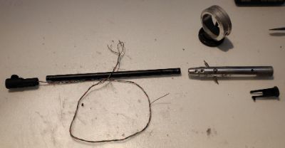 The tonearm removed. Quite dirty and the wires seem a bit naff now. Removed tonearm